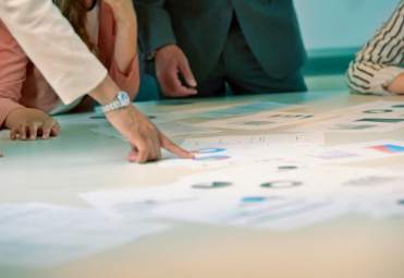 Family meeting with a financial adviser to review long-term wealth plans
